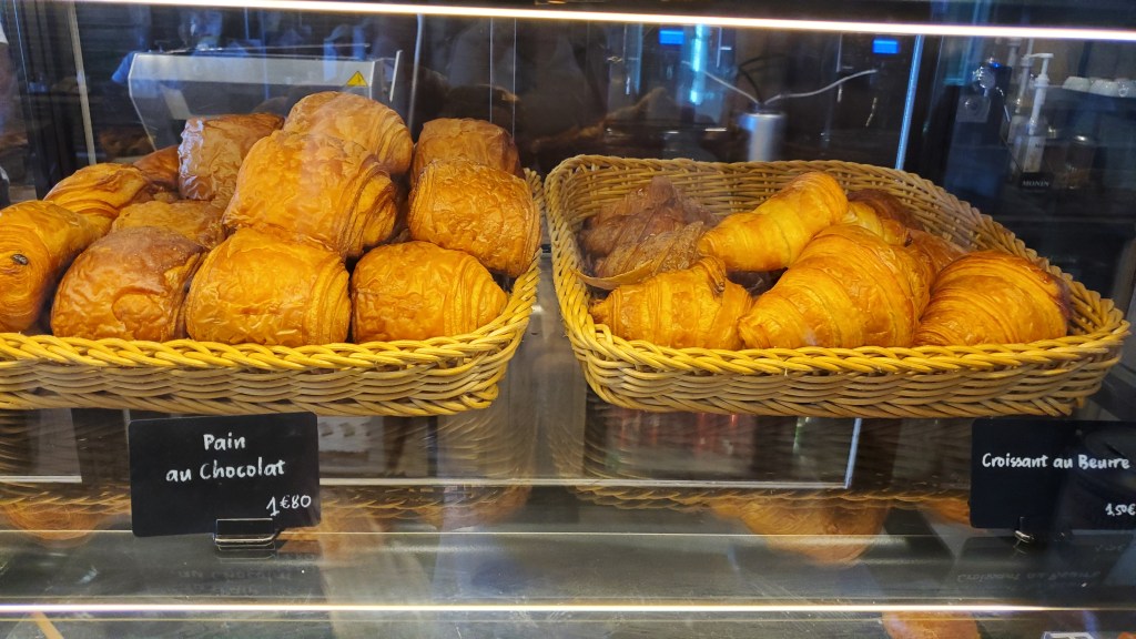 Baskets of pain au chocolat and croissant at the boulangerie